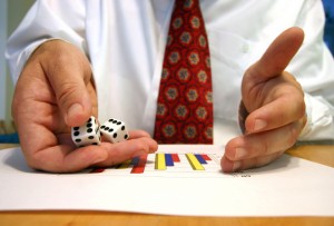 Who has the financial risk on a merchant account?